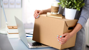 woman at desk during office move