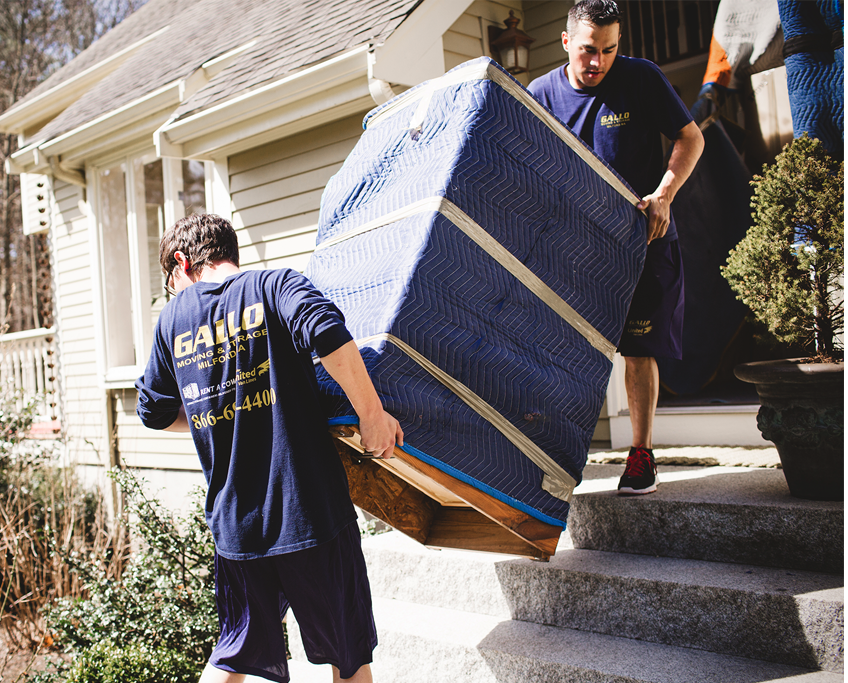 Franklin MA movers moving a price of furniture from a home